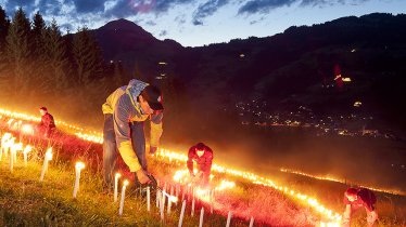 Bij de Brixentaler Bergleuchten worden meer dan 50.000 fakkels ingezet, © Markus Mitterer / TVB Kitzbüheler Alpen-Brixental